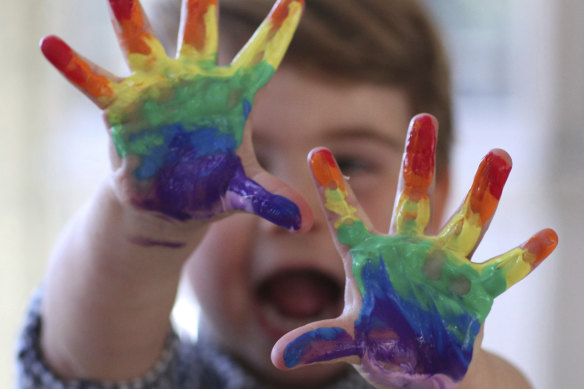 Britain's Prince Louis joins the rainbow wave in a picture released by his mother to celebrate his second birthday.