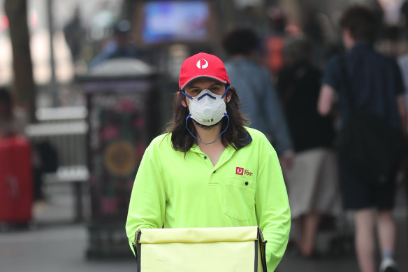 Posties were also told to wear masks while they worked outside.