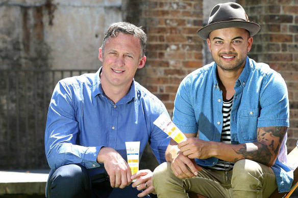 Guy Sebastian and his former agent Titus Day (left).