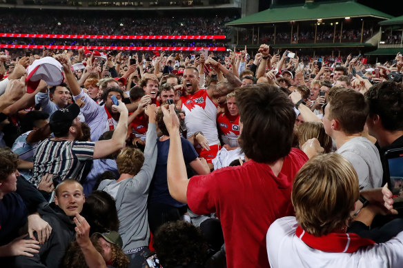Lance Franklin celebrates kicking his 1000th goal against Geelong in round two.