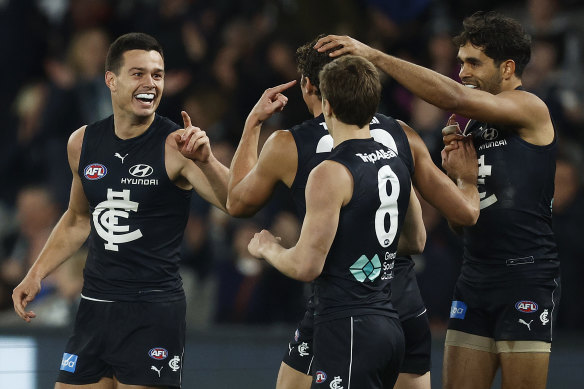 Jack Silvagni with teammates.