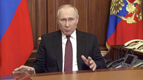 Russian President Vladimir Putin gives a televised address on Thursday.