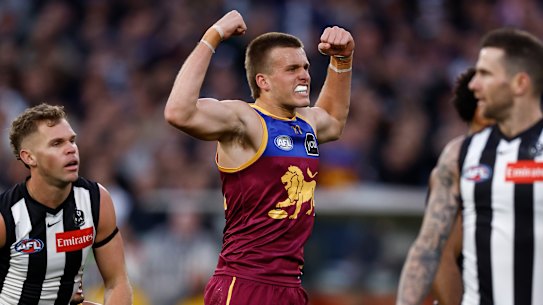 Ty Gallop of the Lions celebrates a goal during the AFL First Preliminary Final match between the Collingwood Magpies and the Brisbane Lions at the Melbourne Cricket Ground.