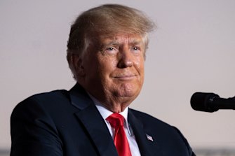 Officials told former president Donald Trump, pictured, that they would resign if he put Jeffrey Clark in charge at the Justice Department.