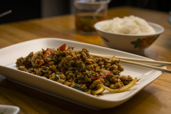 Pad krapow with chicken, holy basil, ground chilli, garlic and coriander.