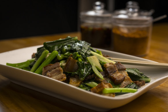 Crispy pork with Chinese broccoli.