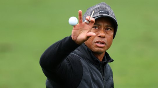 Tiger Woods made the cut at The Masters for a 23rd straight time.