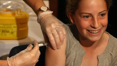 Sophie Weisz, 14, receives the HPV vaccine in 2006 as part of Australia's march towards 95 per cent herd immunity. 