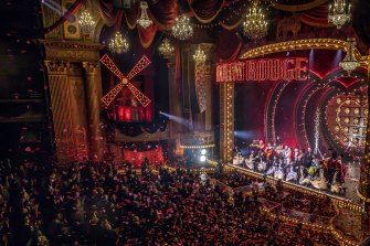 Cast and audience celebrate the opening night of Moulin Rouge! the Musical in Melbourne