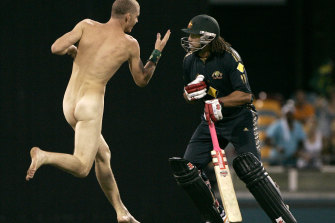 Andrew Symonds about to knock a streaker flat at the Gabba, March 2008.