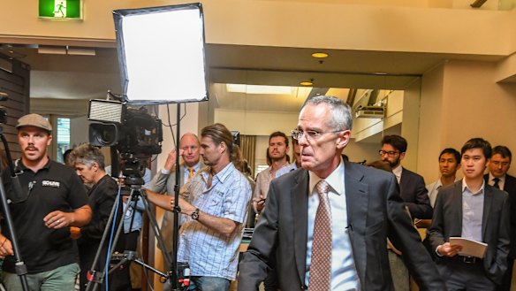 ACCC Chair Rod Sims arrives to speak to the media about the release of the preliminary report of the Digital Platforms Inquiry.