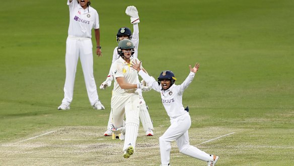 Indian players appeal for the wicket of Ellyse Perry.
