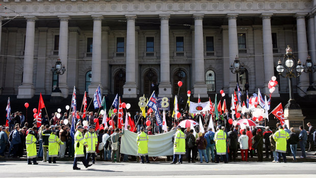 The 150th anniversary of the Eight Hour Day is celebrated on the steps of Parliament House in Melbourne in 2006.
