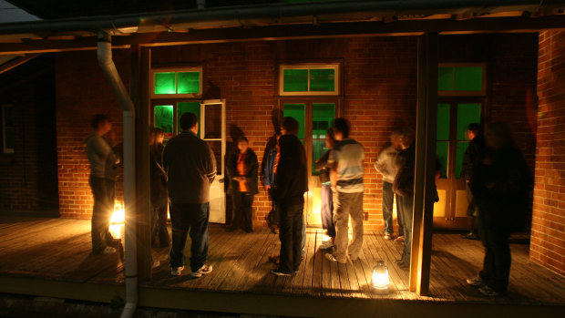 A group visits the Quarantine Station for a Night Ghost Tour at North Head near Manly.