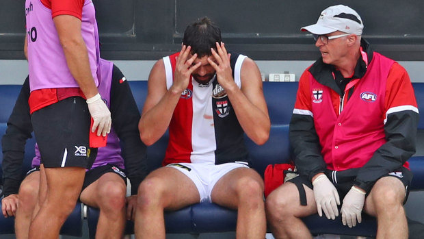 Saint scare: Paddy McCartin's pre-season comes to a worrying end with another knock to the head.
