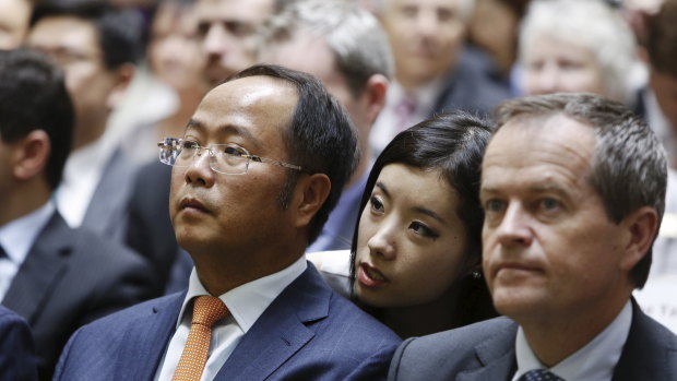 United Front figure Huang Xiangmo and Labor politician Bill Shorten in 2013.