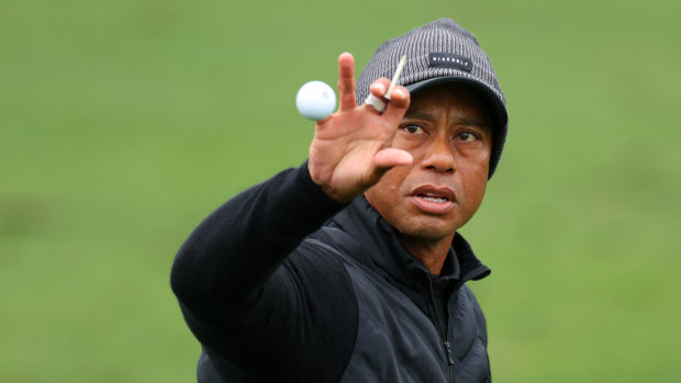 Tiger Woods made the cut at The Masters for a 23rd straight time.