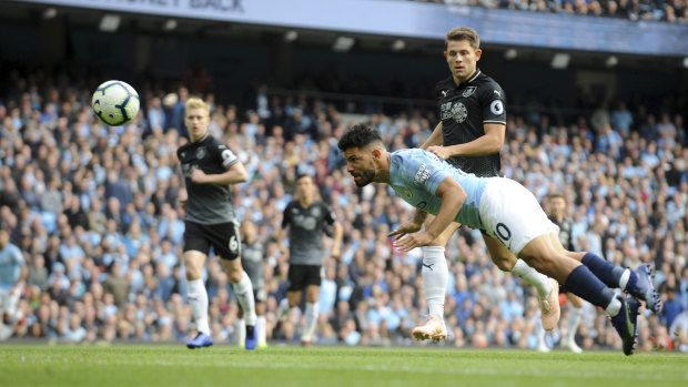 Soaring: Sergio Aguero was on the scoresheet once more in City's thrashing of Burnley.