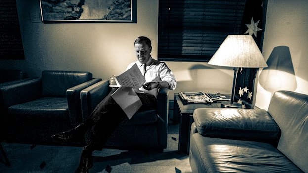 Treasurer Peter Costello looks over his twelfth budget late into the night before budget day in 2007.  