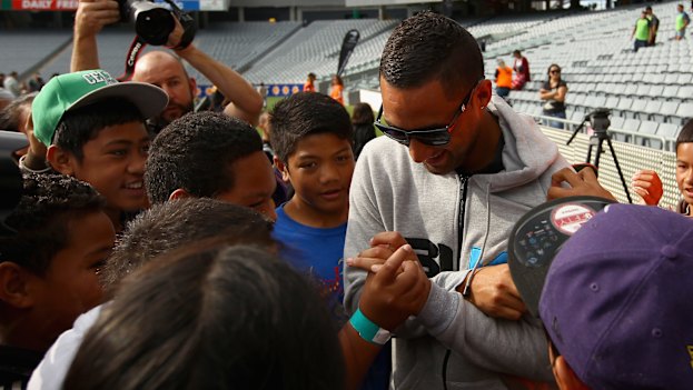 Benji Marshall is mobbed by young fans when he returned home to New Zealand for a Test match in 2012.