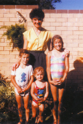 Pauline Hanson in the front yard of the family home in Ipswich with three of her children: Adam, Lee and Amanda.