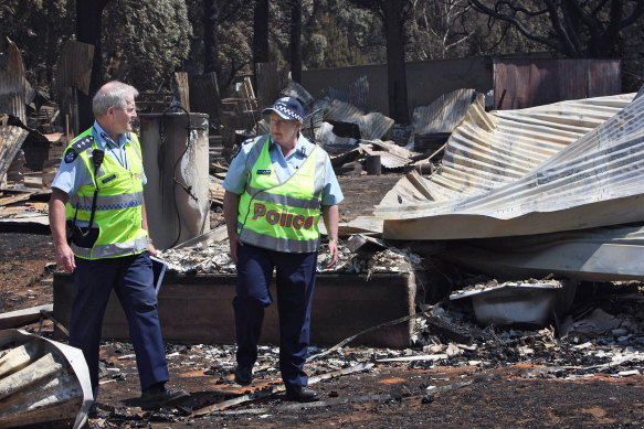 Christine Nixon tours the devastated town of Kinglake after the 2009 Black Saturday bushfires. 