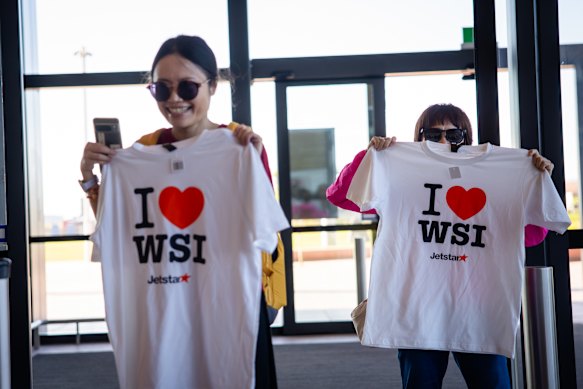 TT Huang, left, and her mother, Jaing Liu arrive at the airport to check in for the inaugural passenger flight.