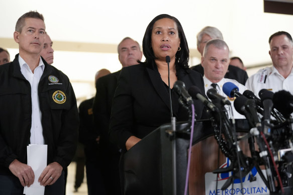 District of Columbia Mayor Muriel Bowser (centre).