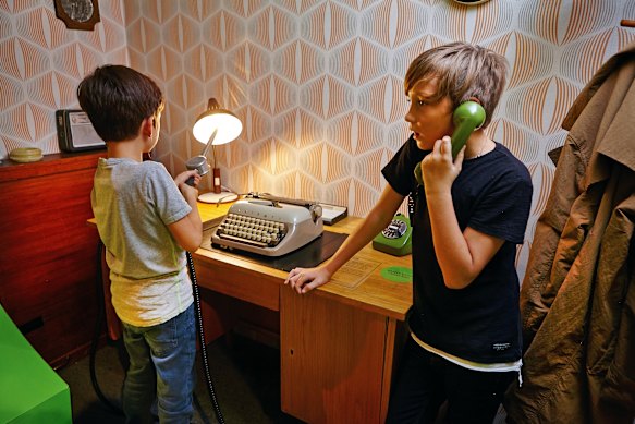 Looking for bugs in a retro office. 