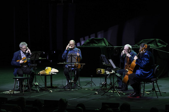 Old-style dial phones were among the quirky props the quartet used.