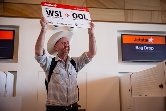 A passenger in the check-in area before walking onto the first flight.
