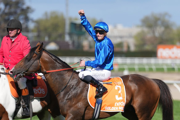 James McDonald punches the air after winning the Caulfield Guineas on Golden Mile last spring.