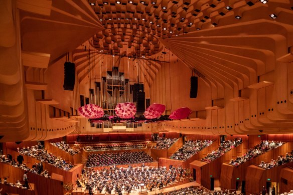With a budget of $150 million, the concert hall stage was rebuilt and new fibreglass petals, spanning between three and six metres, were added.