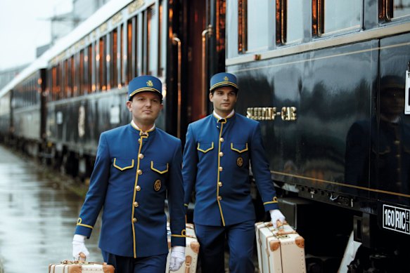 The attendants are dressed in gold-trimmed midnight blue to match the colour of the carriages.