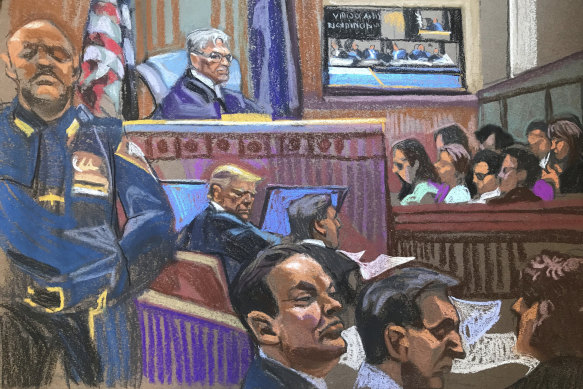 In this courtroom sketch, former president Donald Trump (centre) looks over his shoulder as he sits next to his lawyer, Todd Blanche, on the second day of jury selection for his criminal trial in Manhattan.