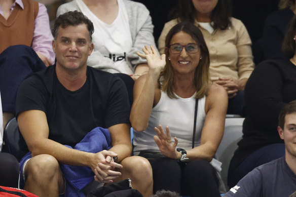 Hayley Lewis and husband Greg Taylor in the stands on Wednesday.