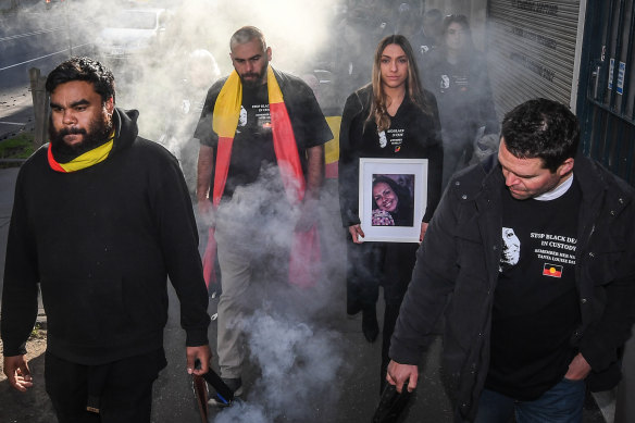 Tanya Day’s family and supporters take part in a smoking ceremony before the 2019 coronial inquest into her death.