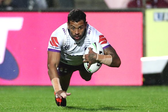 Josh Addo-Carr of the Storm scores a try against the Sea Eagles.