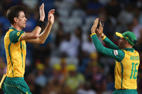 Marco Jansen celebrates a wicket with South African teammate Keshav Maharaj.