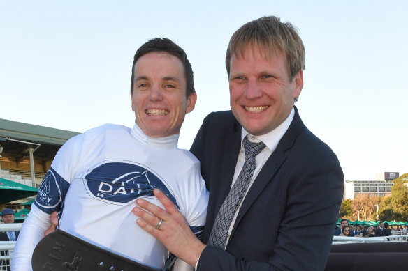 Bjorn Baker (right) and Tim Clark celebrate Samadoubt's Winx Stakes success.