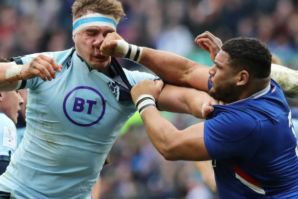 Mohammed Haouas of France punches Jamie Ritchie of Scotland and is later sent off.