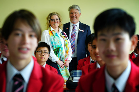 Auburn High School principal Ross Pritchard and assistant principal Kristie Satilmis with students. 