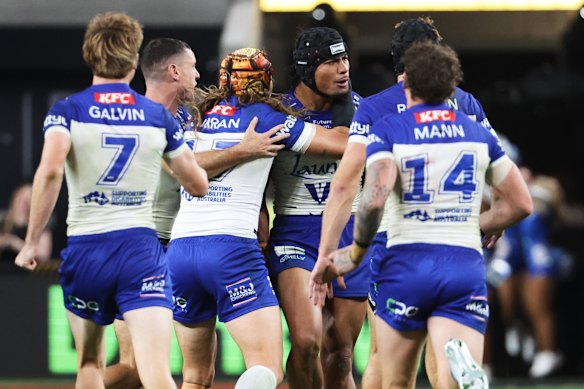 Canterbury celebrate the winning field goal by Stephen Crichton (centre).