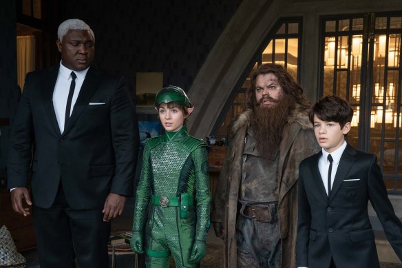 From left, Nonso Anozie, Lara McDonnell, Josh Gad and Ferdia Shaw in a scene from Artemis Fowl.