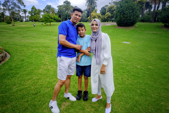 Zeynab Mohseni, right, with husband Asif Rezai and their son Biniamin at Footscray Park on Australia Day.