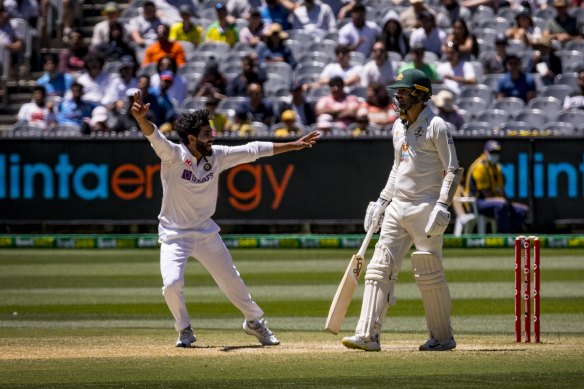 Ravindra Jadeja appeals for lbw against Mitchell Starc on day four at the MCG.