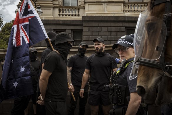 Neo-Nazis, led by Thomas Sewell, marched on Spring Street on Saturday.