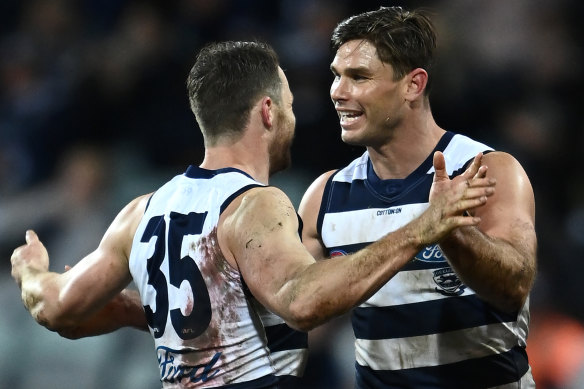 Patrick Dangerfield and teammate Tom Hawkins in 2021.