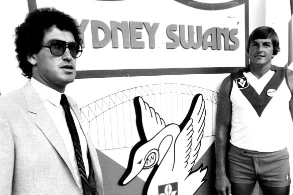 Coach Ricky Quade and captain Barry Round launching the Swans in Sydney in February 1982.