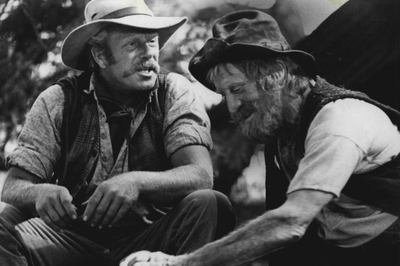 Douglas in his other role in the film, as Harrison's brother Spur, with Jack Thompson as Clancy.